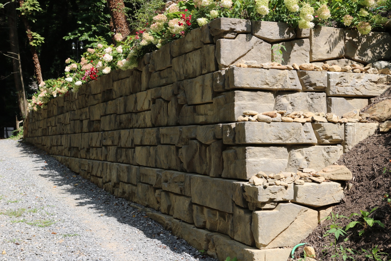 Stained retaining wall installation